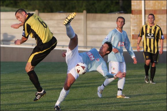 Marcus in action for Bath City in July 2009