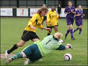 Grace rounds the keeper...