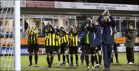 The City players applaud the travelling T-Enders at Kenilworth Road