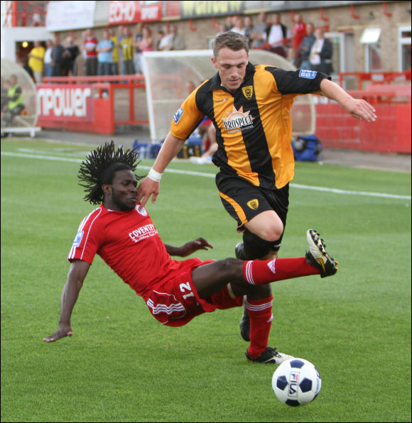 James Bloom is almost decapitated by hapless FGR defender Jeffrey Imudia