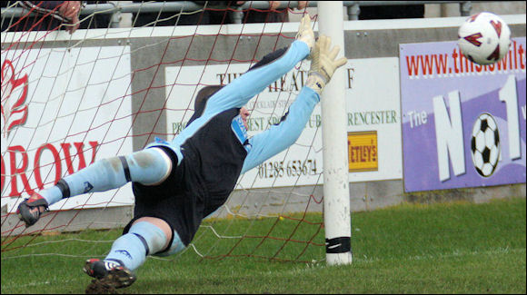 Halesowen keeper Nick Bussey guesses the right way but is still unable to stop Lee Smith's spot kick