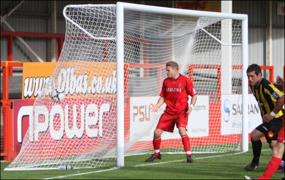 Matt Coupe turns to celebrate after his header brings City level against Droylsden