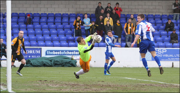 Chester keeper John Danby saves a header from Darren Edwards