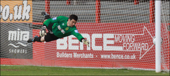 Alfreton keeper Chris Mackenzie can't get close to Darren Edwards' glancing header