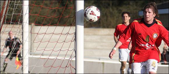 Farnborough's Leigh Rumbold can only watch as Jack Pitcher's header goes inches wide