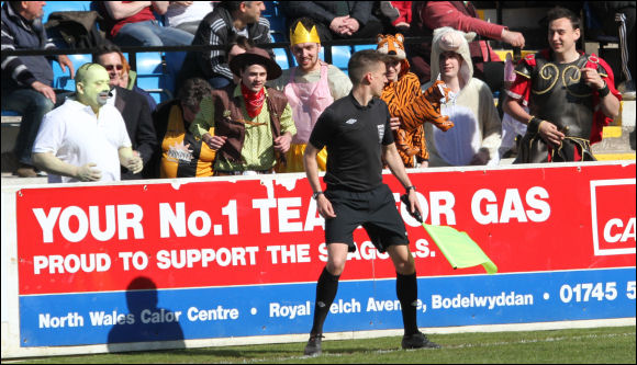 The City fans follow the lino at Colwyn Bay