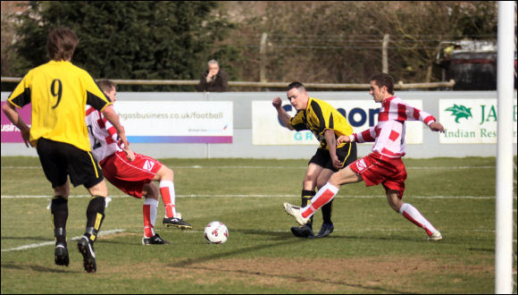 Lee Smith squares the ball for Will Morford to score City's second