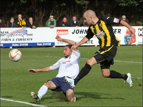 Lewis Hogg's shot is blocked by Yate left back Jake Cox