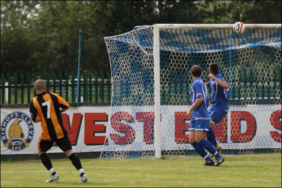 Lewis Hogg's shot roasts the crossbar at Cleeve