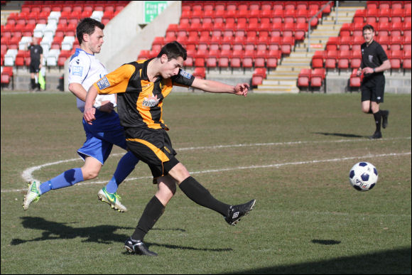 Youngster Josh Hunt tries his luck against Vauxhall Motors