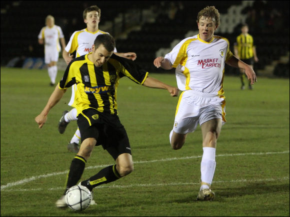 Jack Pitcher scores his second and City's third against Tiverton Town