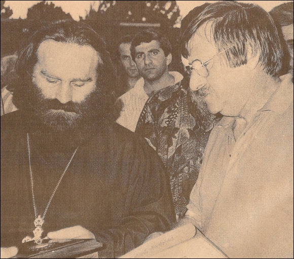 John Beacham swaps gifts with the local religious leader in Achaltsiche