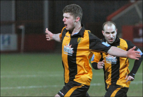 Matt Liddiard laps up the attention after his late equaliser against Colwyn Bay