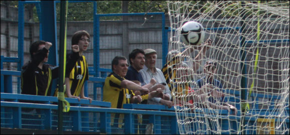 City's fans start to celebrate as Sam Malson's shot hits the back of the net