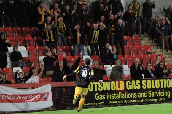 Adam Mann celebrates in front of the City faithful after equalising against Solihuill Moors