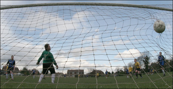 Laura Meheran powers a header beyond the Cheltenham keeper to equalise for City