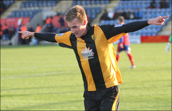 Will Morford celebrates after scoring his first and City's second goal at Hinckley