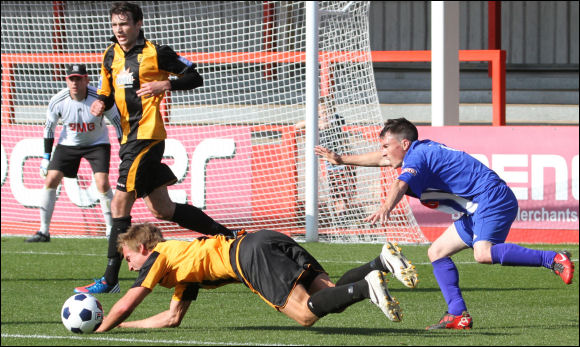 Will Morford goes down against Thatcham and City win a penalty