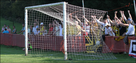 City's fans celebrate as Will Morford's shot hits the back of the net