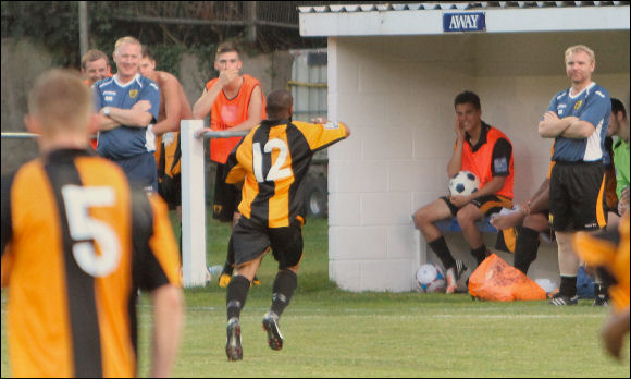 Liam Antonio Orchard heads towards a bemused City bench after scoring