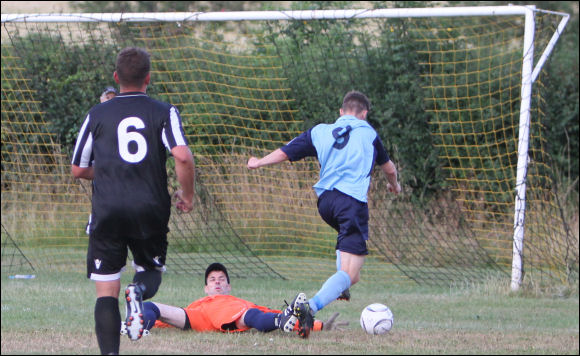Joe Parker rounds the keeper to score at Brockworth