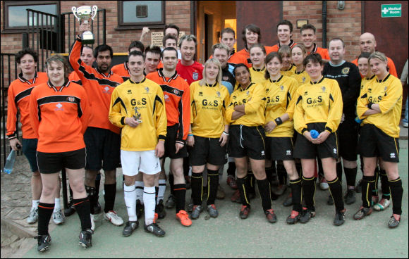 Both the Supporters and Ladies Teams line up after the Pete Chase Cup at Meadow Park