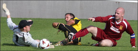 Jack Pitcher squeezes the ball past Bedford keeper Mike Armitt albeit with no reward