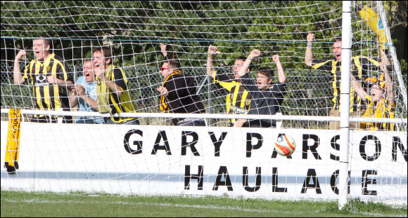 The City fans celebrate Jack Pitcher's opening goal at Bashley