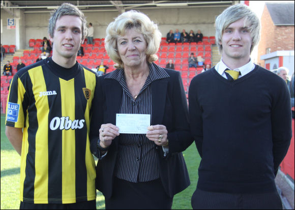 Sandra Chase presents Callum and Brandon Preece with the Pete Chase bursary