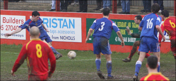 Jamie Reid grabs City's equaliser against Banbury with a shot at the far post