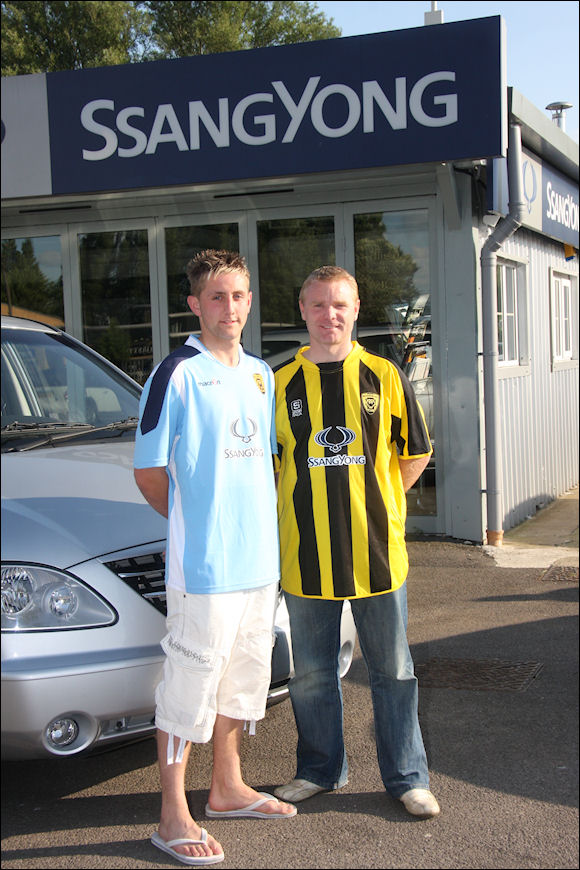 Lee Marshall and Neil Mustoe show off this season's shirts adorned by new sponsor Ssangyong Motors