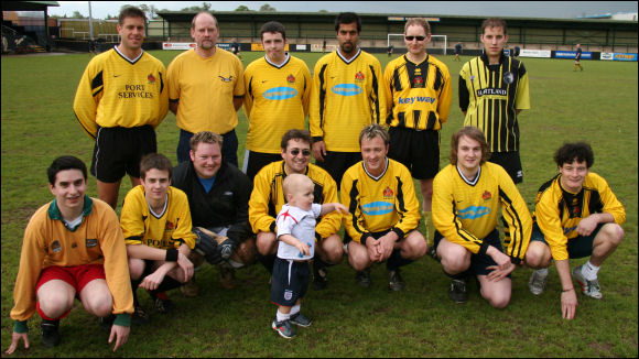 The City Supporters line up before they take on the players at Meadow Park