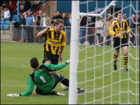 Tom Webb rounds the keeper to score