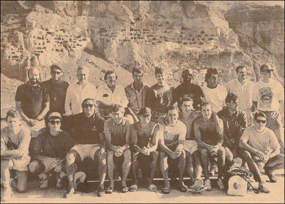 The tour party pose in front of an ancient cave village in Achaltsiche