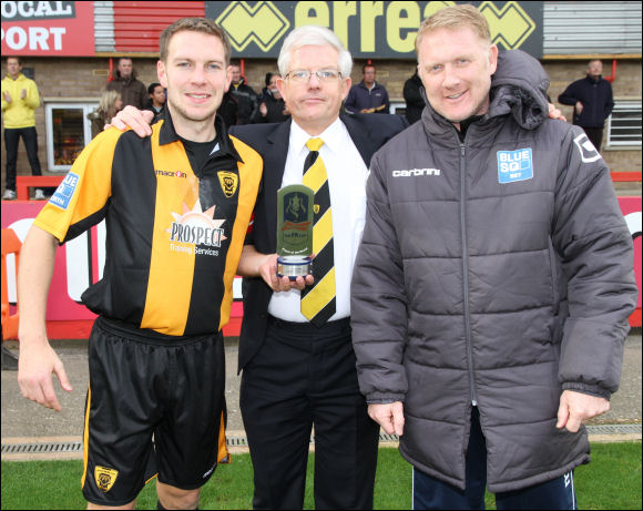 Tom Webb shows off his FA Cup Player of the Round Trophy