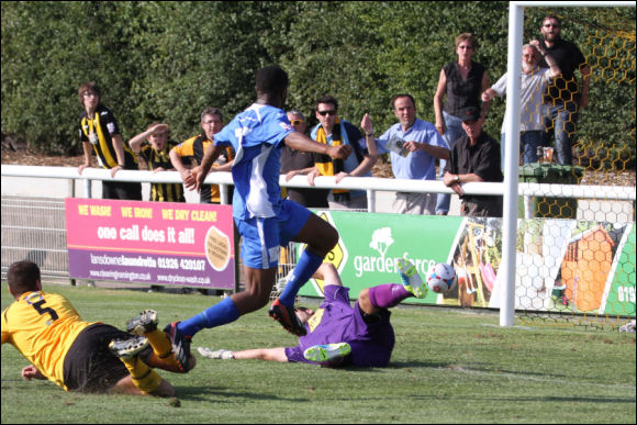 Scott Wilson beats Leamington keeper Tony Breeden to win the game